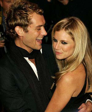 SIENNA MILLER AND JUDE LAW