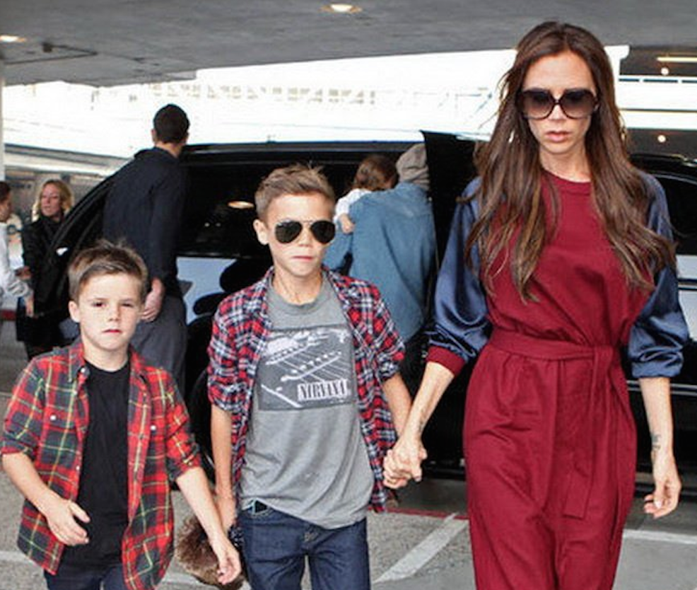 Victoria Beckham: a woman holding